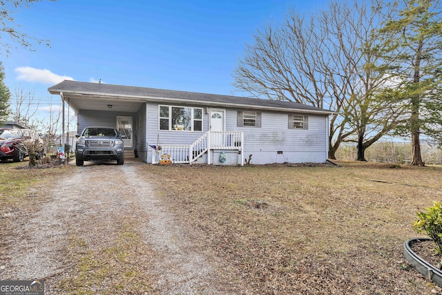 view of front of property with a carport