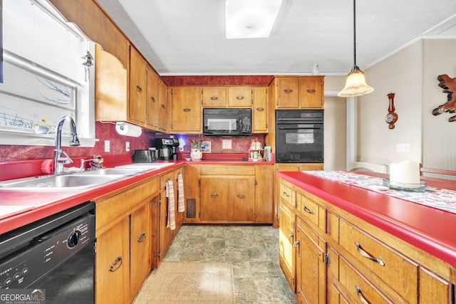 kitchen with decorative backsplash, sink, hanging light fixtures, and black appliances