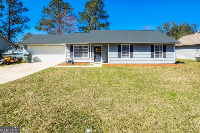 single story home with a garage and a front yard