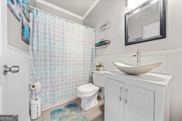 full bathroom with shower / bath combo, tile patterned flooring, vanity, ornamental molding, and toilet