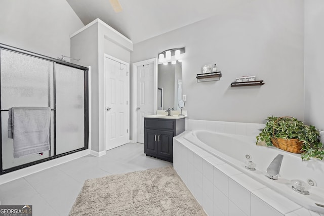 bathroom with vanity, independent shower and bath, and tile patterned flooring