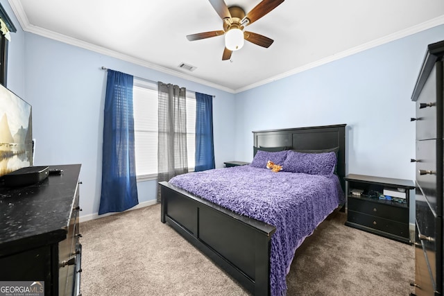 bedroom with crown molding, carpet, and ceiling fan