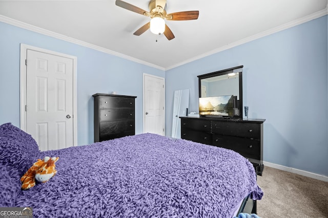 bedroom featuring crown molding, ceiling fan, and carpet