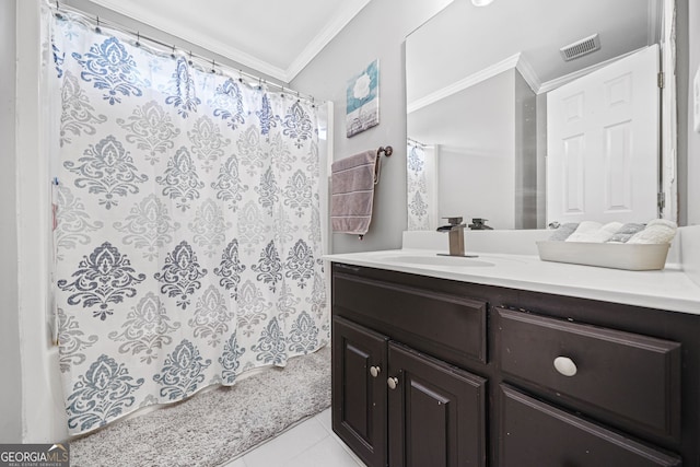 bathroom featuring vanity, tile patterned flooring, crown molding, and shower / tub combo