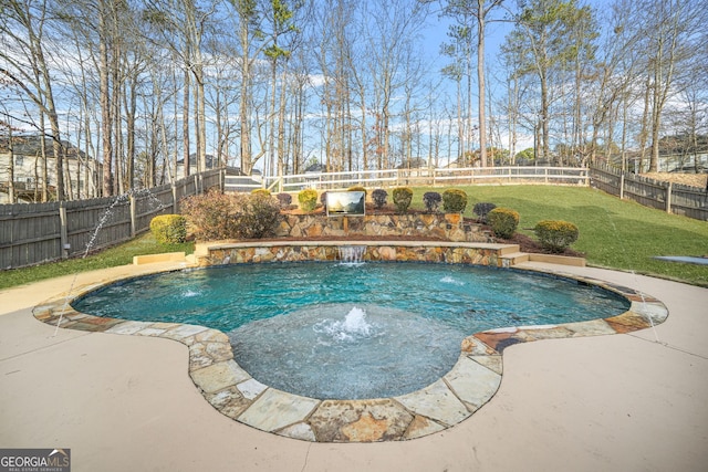 view of pool featuring pool water feature, a yard, and a patio area