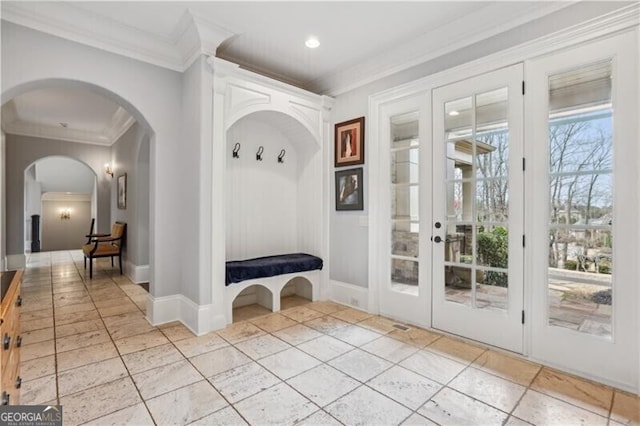 mudroom featuring ornamental molding