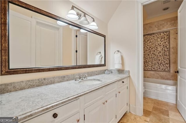 bathroom featuring vanity and tub / shower combination