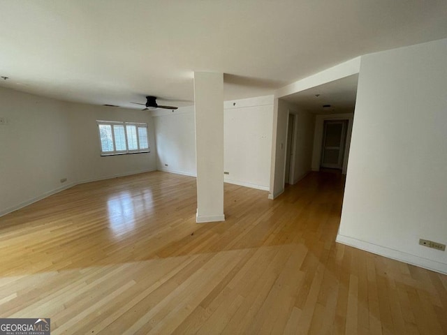 interior space with ceiling fan and light wood-type flooring