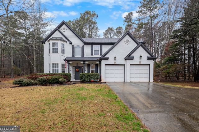 front of property with a front lawn and a porch