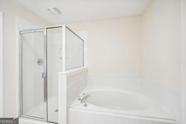 bathroom with independent shower and bath