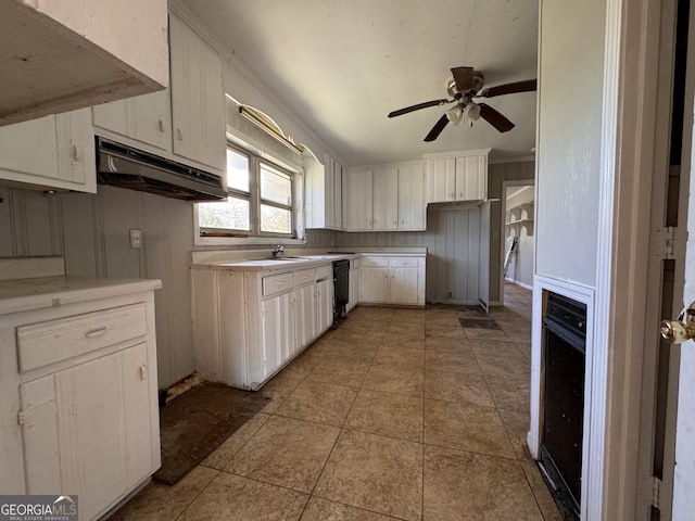 kitchen featuring white cabinetry, light tile patterned floors, dishwasher, and ceiling fan