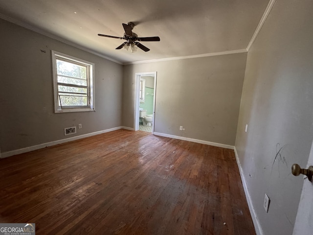 unfurnished room featuring crown molding, ceiling fan, and dark wood-type flooring