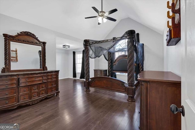 bedroom with lofted ceiling, dark wood-type flooring, and ceiling fan