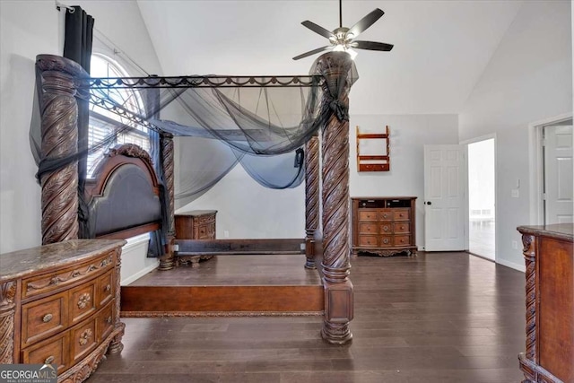 interior space with lofted ceiling, dark hardwood / wood-style flooring, and ceiling fan