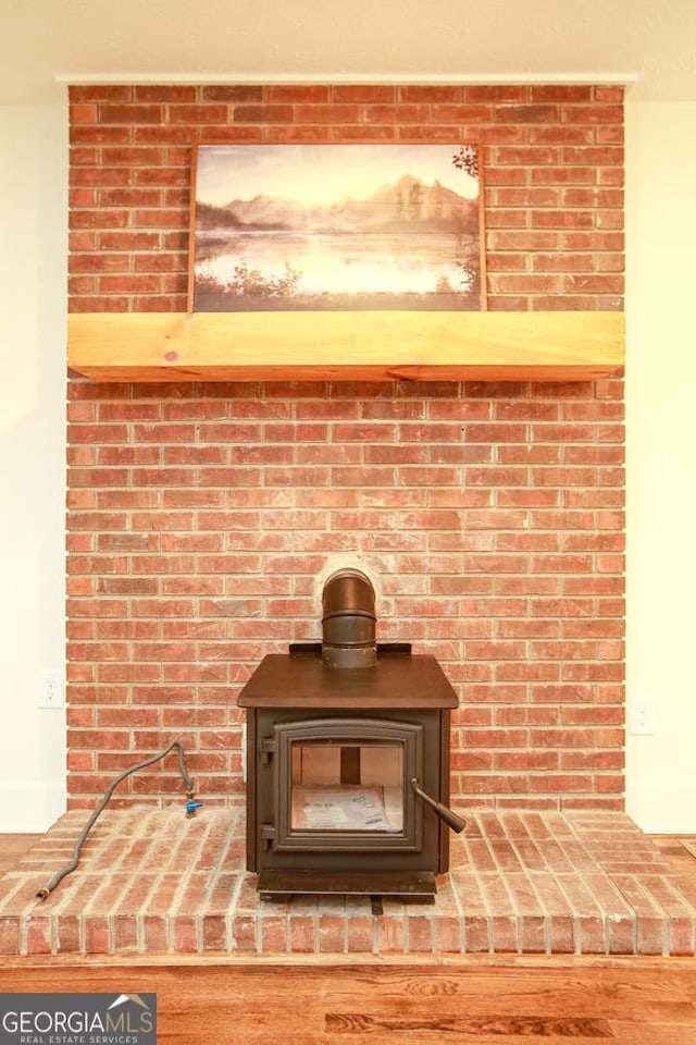 interior details featuring a wood stove