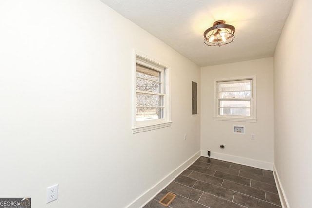 laundry area featuring washer hookup, electric panel, and hookup for an electric dryer