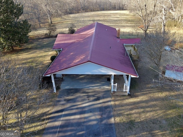 birds eye view of property featuring a rural view