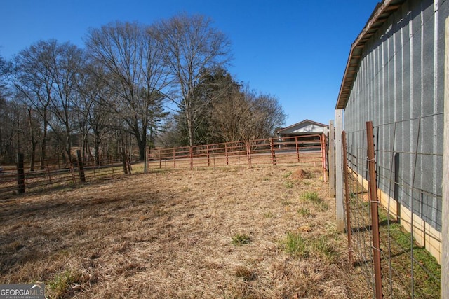 view of yard featuring a rural view