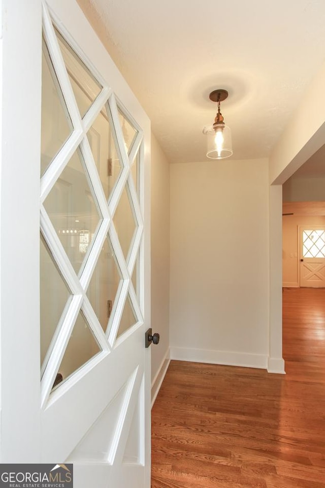 interior space with hardwood / wood-style floors