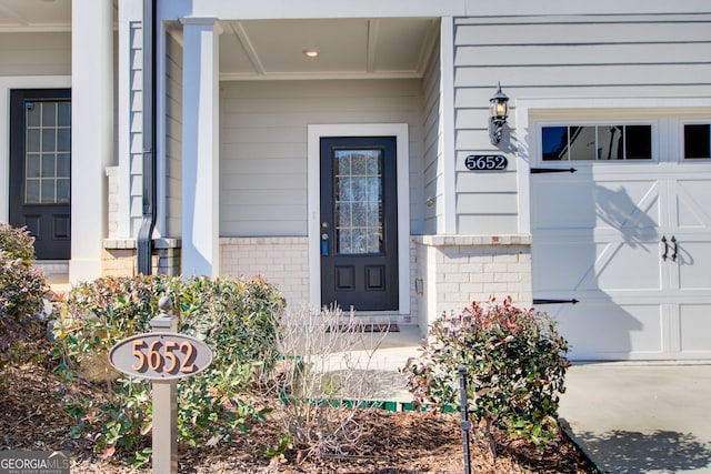 property entrance featuring a garage