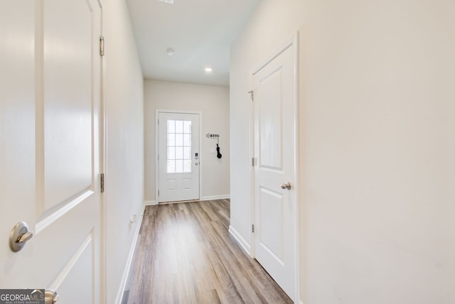 doorway to outside featuring light hardwood / wood-style flooring