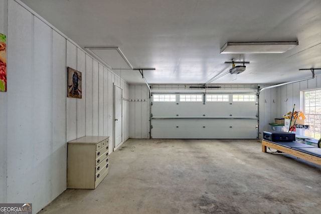 garage featuring a garage door opener