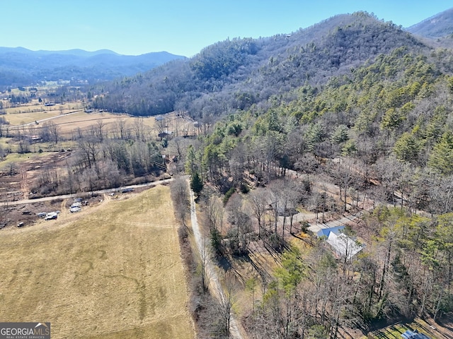 aerial view featuring a mountain view and a rural view