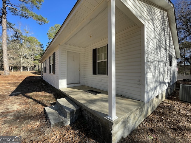 entrance to property with central AC unit