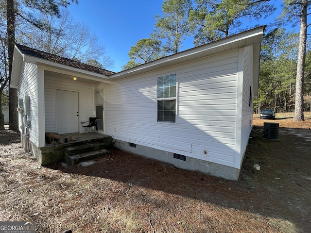 view of front of home featuring central AC unit