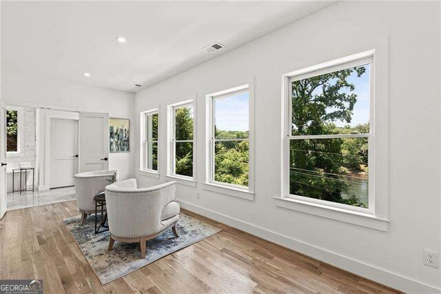 dining space featuring hardwood / wood-style floors