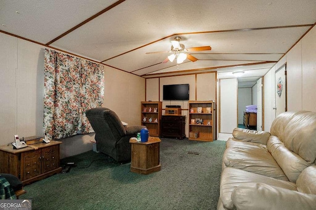 carpeted living room with a textured ceiling, vaulted ceiling, and ceiling fan