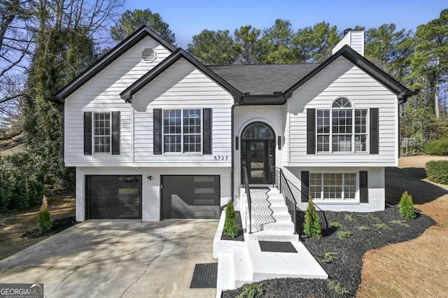 split foyer home featuring a garage