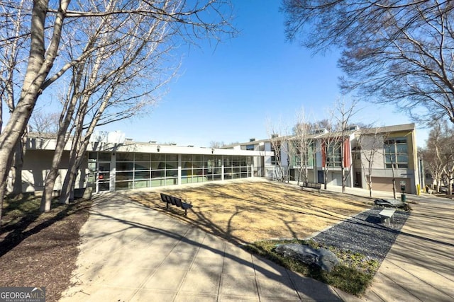 view of front of property with a sunroom