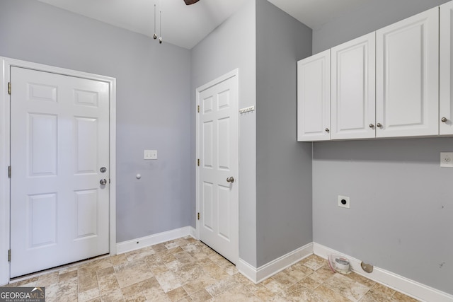 laundry area featuring electric dryer hookup, cabinets, and ceiling fan