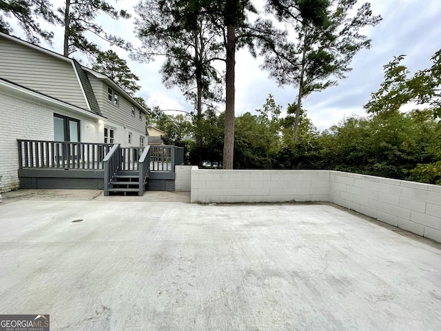 view of patio featuring a wooden deck