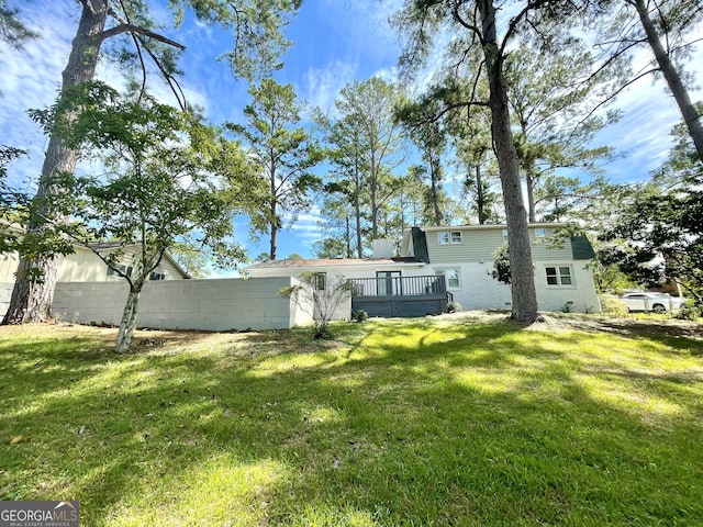 view of yard with a deck