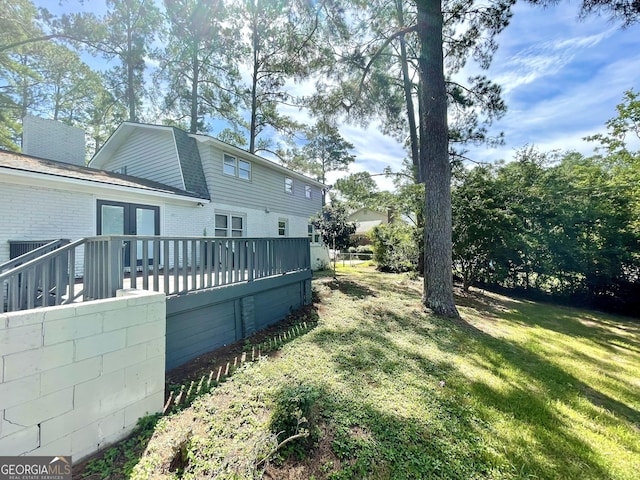 view of yard with a deck