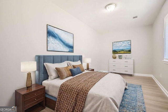 bedroom featuring light hardwood / wood-style floors