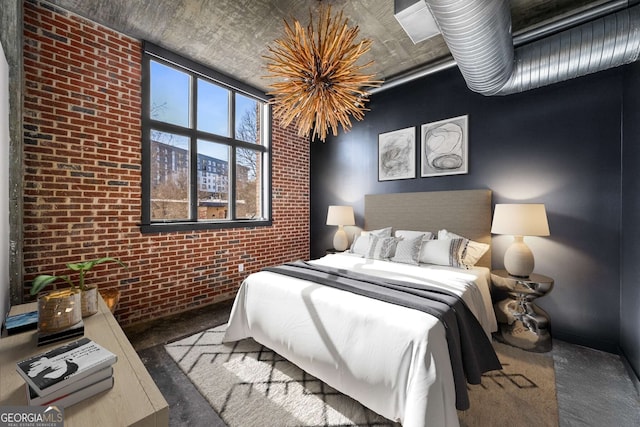 bedroom with brick wall