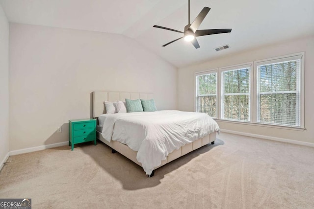 carpeted bedroom with lofted ceiling and ceiling fan