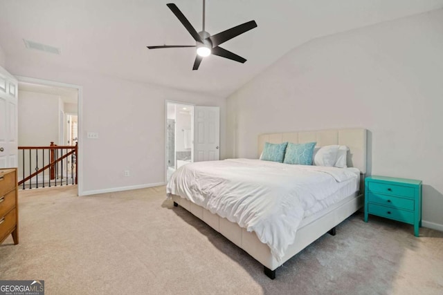 bedroom featuring lofted ceiling, light carpet, and ceiling fan