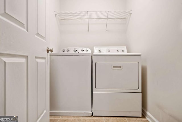 laundry room featuring independent washer and dryer