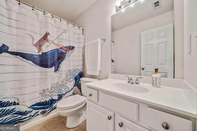 bathroom featuring tile patterned flooring, vanity, a shower with shower curtain, and toilet