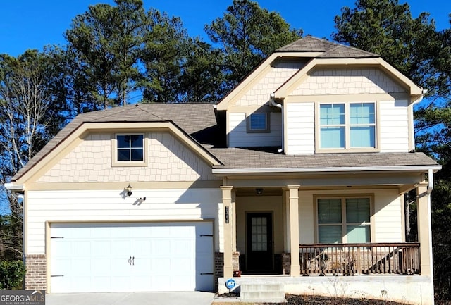 craftsman inspired home featuring a porch and a garage