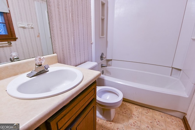 full bathroom with bathtub / shower combination, tile patterned floors, vanity, and toilet