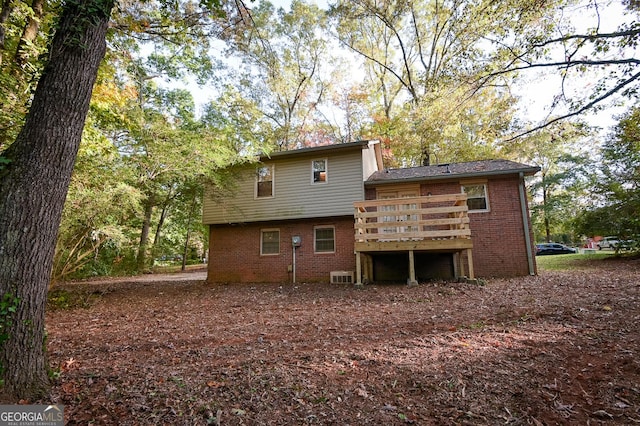 rear view of property with a deck