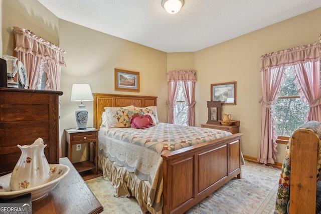 bedroom featuring a textured ceiling