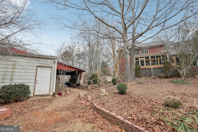 view of yard with a sunroom