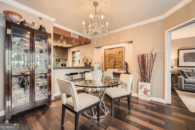 dining space featuring crown molding, dark hardwood / wood-style floors, and an inviting chandelier