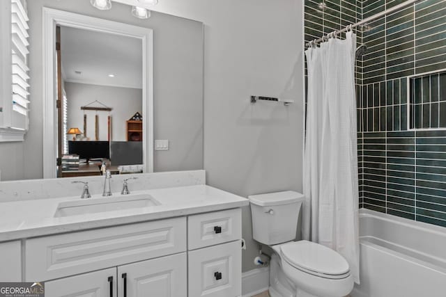 full bathroom featuring vanity, toilet, and shower / bath combo